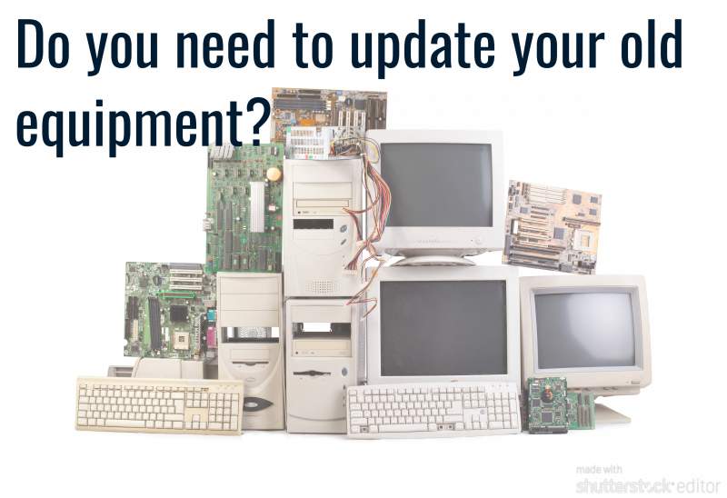 Old computer equipment, including monitors, keyboards, and circuit boards, stacked together with text asking about updating.