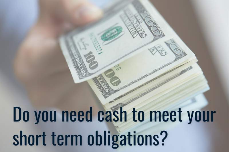 A hand holds a stack of hundred-dollar bills with the text, "Do you need cash to meet your short term obligations?.